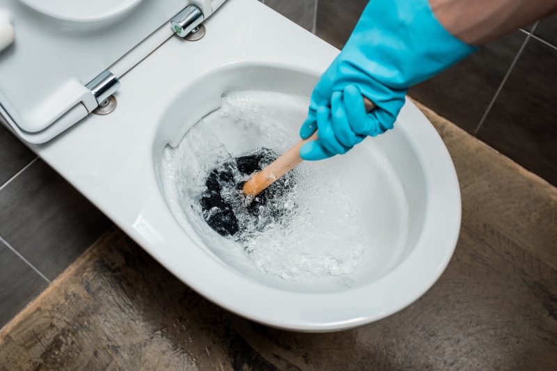 Toilet Water Rises Too High When Flushed?